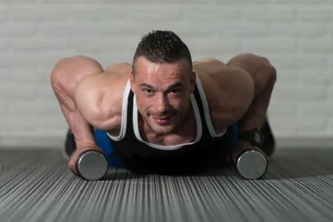 Pushups With Dumbbells Stock Photos