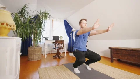 Pushups Home workout Man exercise indoors Stockbeeldmateriaal 195289317
