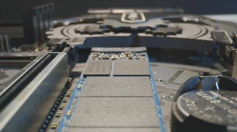 Pusing in into solid state drive with lens Stock Photos