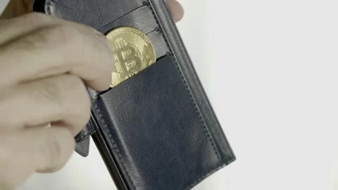 Put Bitcoin in Wallet. Stock Footage 149351891