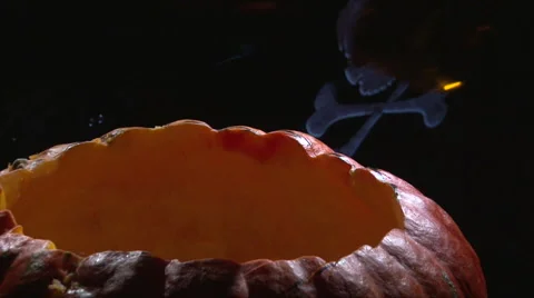 Put bottle beer inside Halloween pumpkin jack o lantern Stock Footage 67738123
