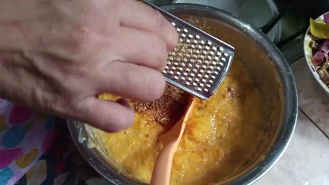 Put the brown sugar slices into the cookie dough Stock Footage 305028122