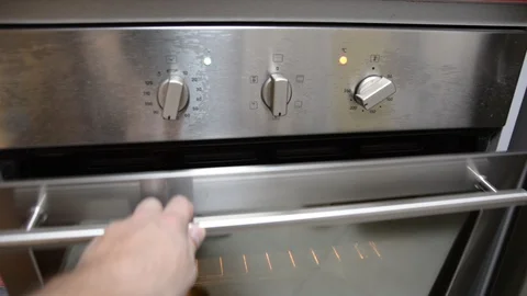 Put cake form in the oven to bake  Video stock 100660821