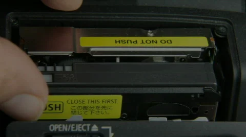 Put cassette in hdp Stock Footage 589205