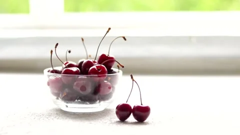 Put the cherries in a vase. Put the berries in a vase. Healthy eating. Sweet Stock Footage 150065357