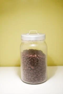 Put the coffee bean jar Stock Photos
