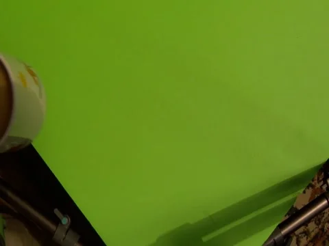 PUT COFFEE CUP ON DOWN ON CHROMA GREEN TAKE 3 Vídeos de archivo 1035509