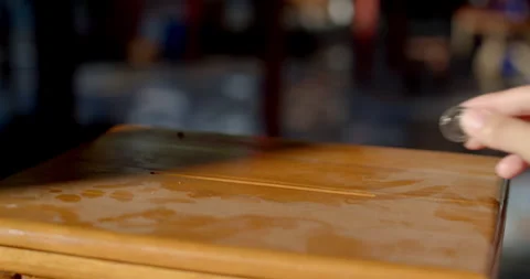 Put coins into the cabinet to make merit.Put the money into the cabinet. Stock Footage 310630847