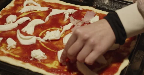 Put cooked ham on a typical Italian pizza - 4K extreme slow motion - rotate Stock Footage 152172538