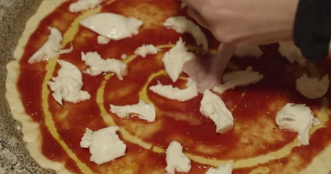 Put cooked ham on a typical Italian pizza - 4K extreme slow motion - top view Stock Footage 152172988