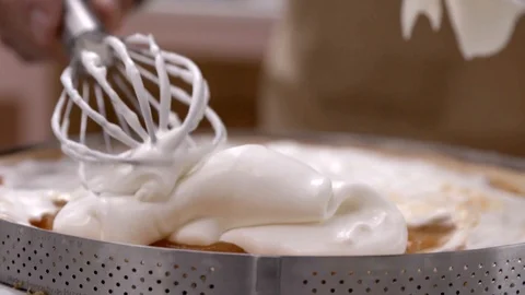 Put cream on the cake Stock Footage 93846800