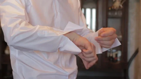 Put cuffs on his shirt Stock-Footage 61813611