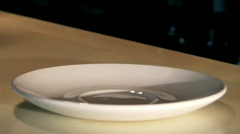 Put a cup on a saucer Stock Footage 660197