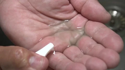 Put the disinfectant on hands Stock Footage 155877680