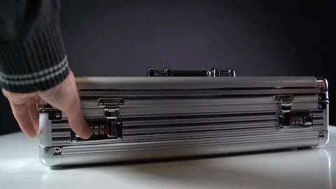 Put dollar bills in a suitcase Stockbeeldmateriaal 127600935