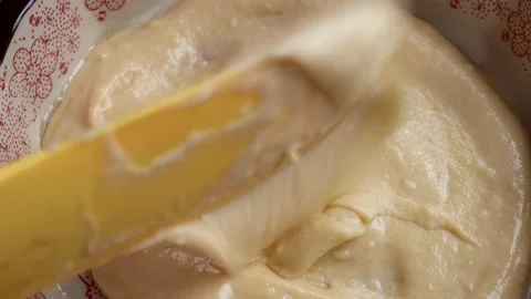 Put the dough into a baking dish. Stages of preparation of cuca de banana. Stock Footage 231967608