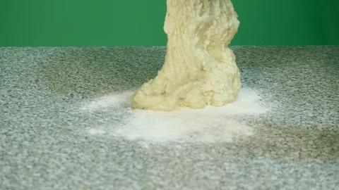 Put dough for cereals on the table top - green screen background Stock Footage 126612990