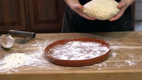 Put the dough in the tray Stock Footage 90395150