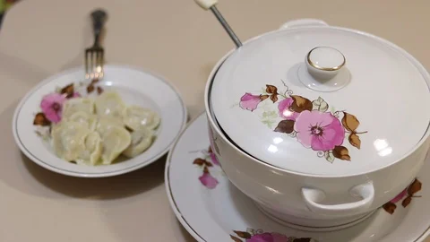 Put dumplings on a plate Stock Footage 126362272