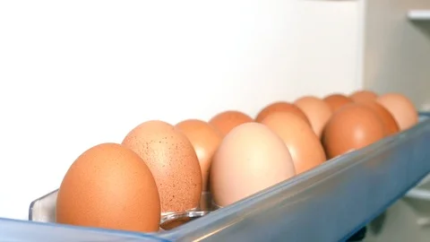 Put egg inside the fridge, slow zoom in Stock Footage 108563191