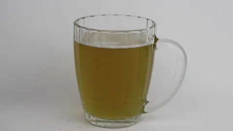 Put fish on a beer mug Stock Footage 164477644