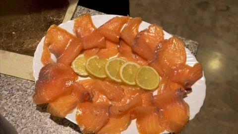 Put the fish in the dish - top view Stock Footage 83781871