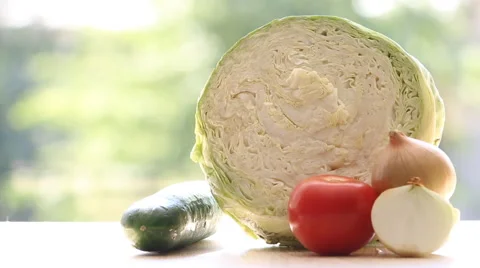 Put fresh vegetables on the table Video stock 51638494