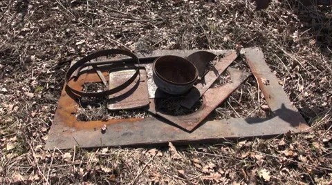 Put gathering rusty metal scrap-iron rubbish for recycling in stack Stock Footage 48056756