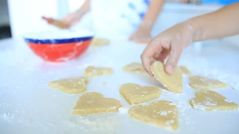 Put gingerbread raw cookies on the table. Close up Stock Footage 100076258