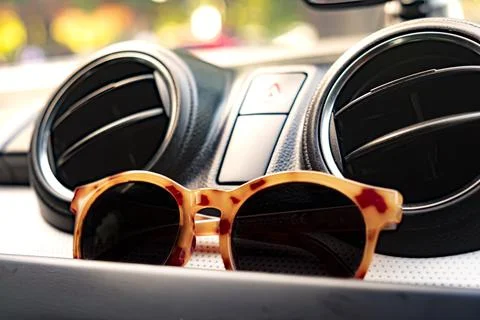 Put the glasses on the car console Stock Photos