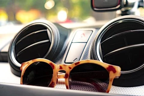 Put the glasses on the car console Stock Photos
