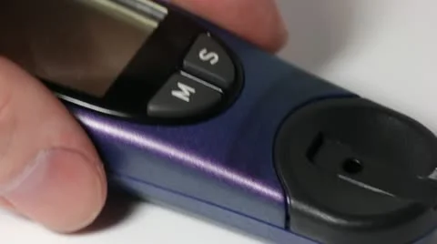 Put a glucometer Stock Footage 12208917