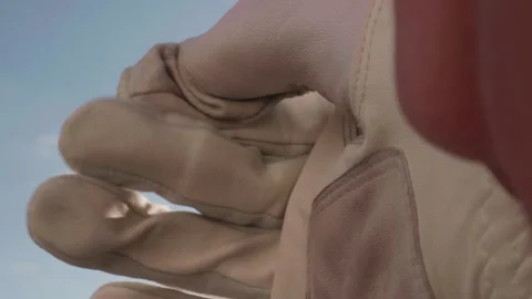 Put on golf glove in white leather Video stock 220611151