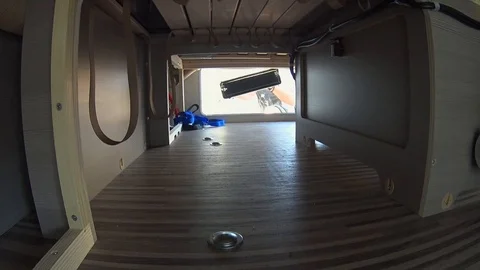 Put Guitar Case In Caravan Storage Space Stock Footage 97149919