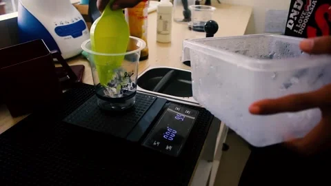 Put ice cubes into a glass Stock-Footage 258809769