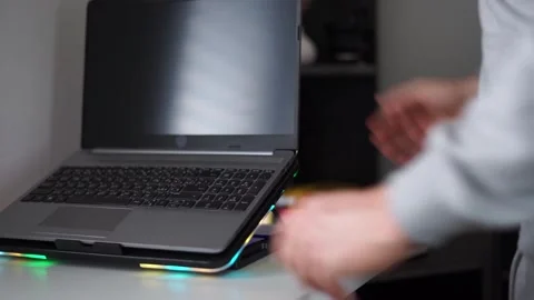 Put the laptop on a stand Stock Footage 261111164