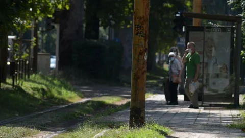 PUt the mask and take a tram Stock Footage 137154715