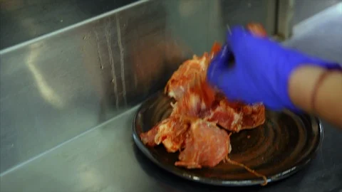 Put on the meat en brochette. Close up shot Stock-Footage 104089115