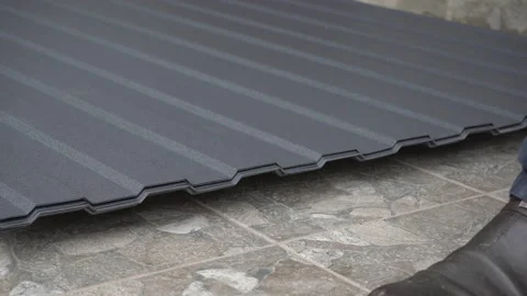 Put metal profile sheets on a pile Stock Footage 268694885