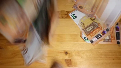 Put money on the table, it rains money, banknotes 50 100 euros Stock Footage 120514518