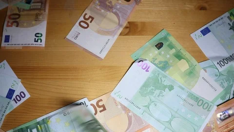 Put money on the table, it rains money, banknotes 50 100 euros Stock Footage 120518430