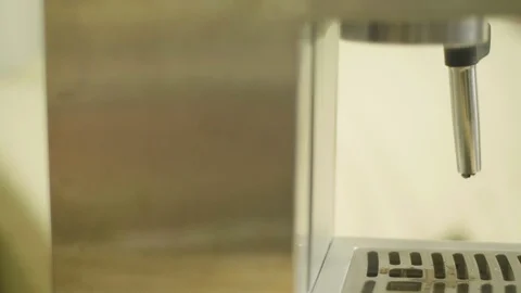 Put the mug in a cappuccino machine Video stock 86640021