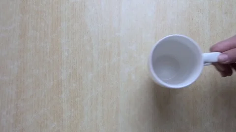 Put the mug on the table Video stock 84765986