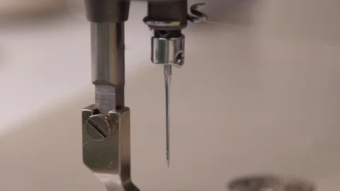 Put needle in the sewing machine Stock Footage