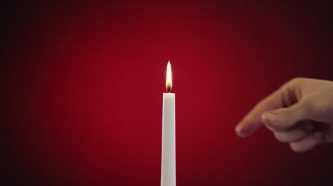 Put out a candle by fingers Stock-Footage 63083519