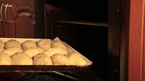 Put the pies in the oven Stock Footage 91287970