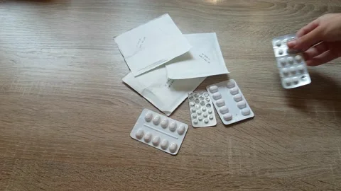 Put Pills On The Table Stock Footage 136674232