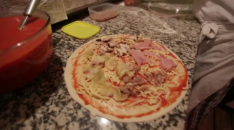 Put on the pizza ingredients Stock Footage 44219071
