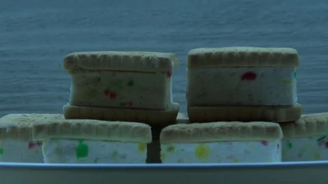 Put the plate with cakes on the table Stock Footage 79988903