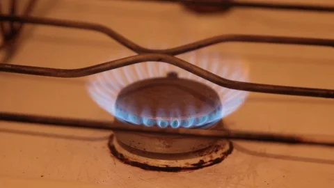 Put the pot on the gas stove Stock Footage 100685465